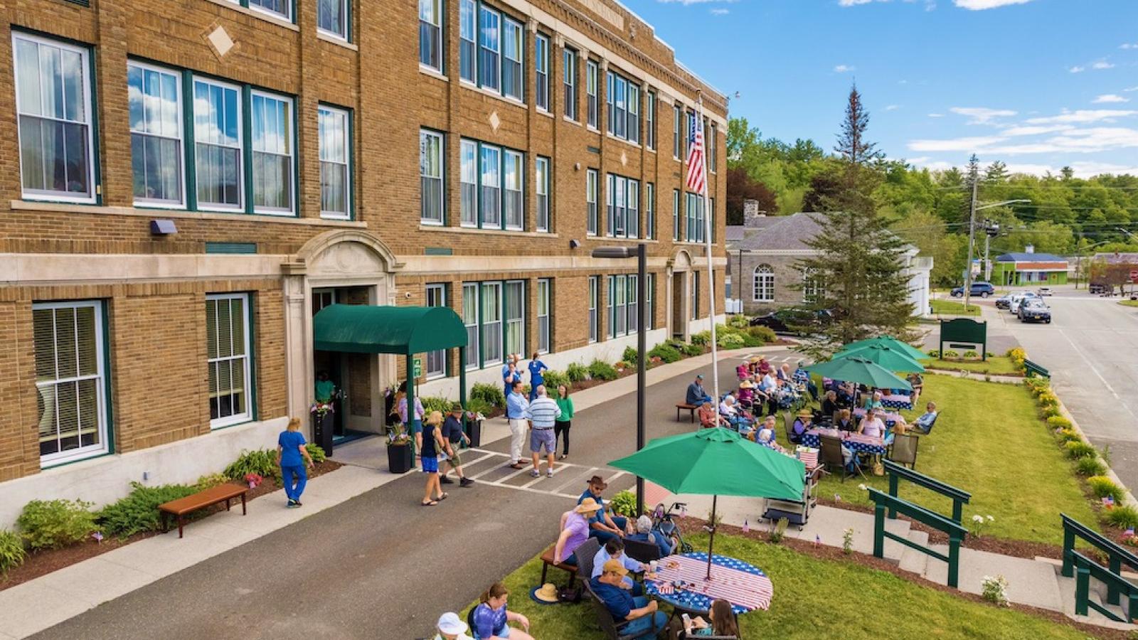 An aerial view showing an outdoor event for our residents.