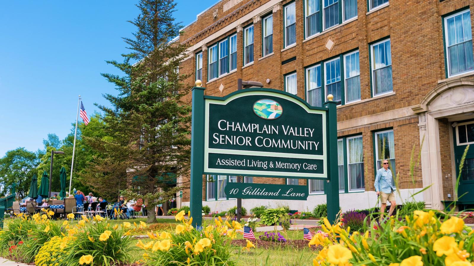 A view of people walking into out facility. The CVSC sign is prominently in frame.