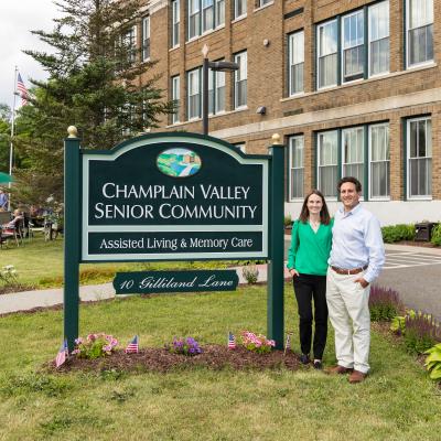 Champlain Valley Senior Community location sign with business Owners Eli and Emily Schwartzberg