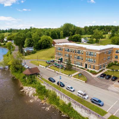 Ariel view of Champlain Valley Senior Living along the shores of the Bouquet River