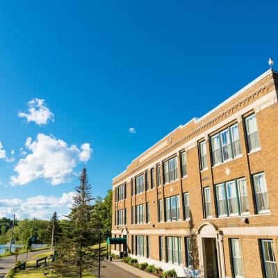 A view of the secure facilities, a three story brick building.